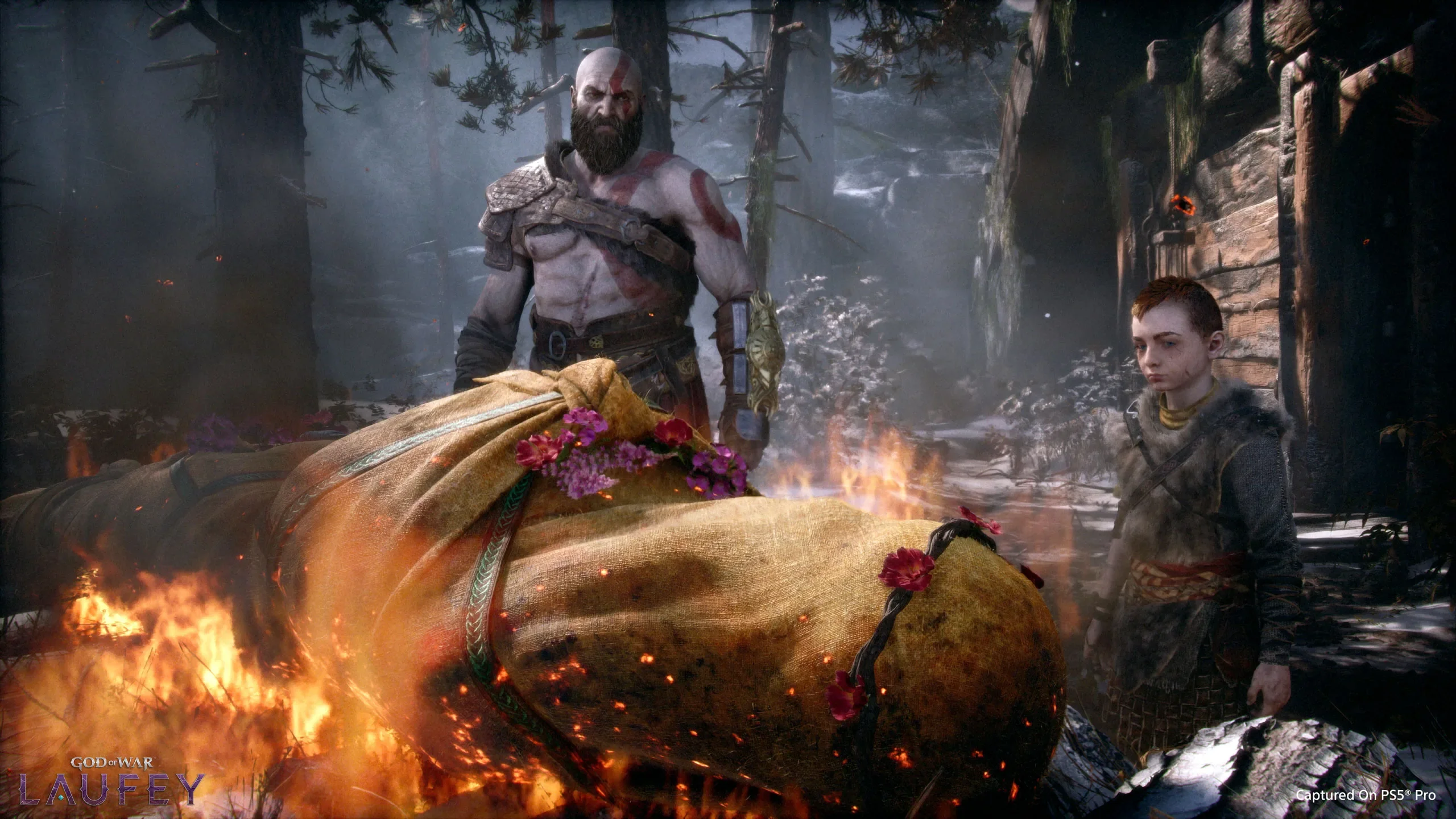 Kratos i Atreus przy stosie pogrzebowym Faye w God of War Laufey