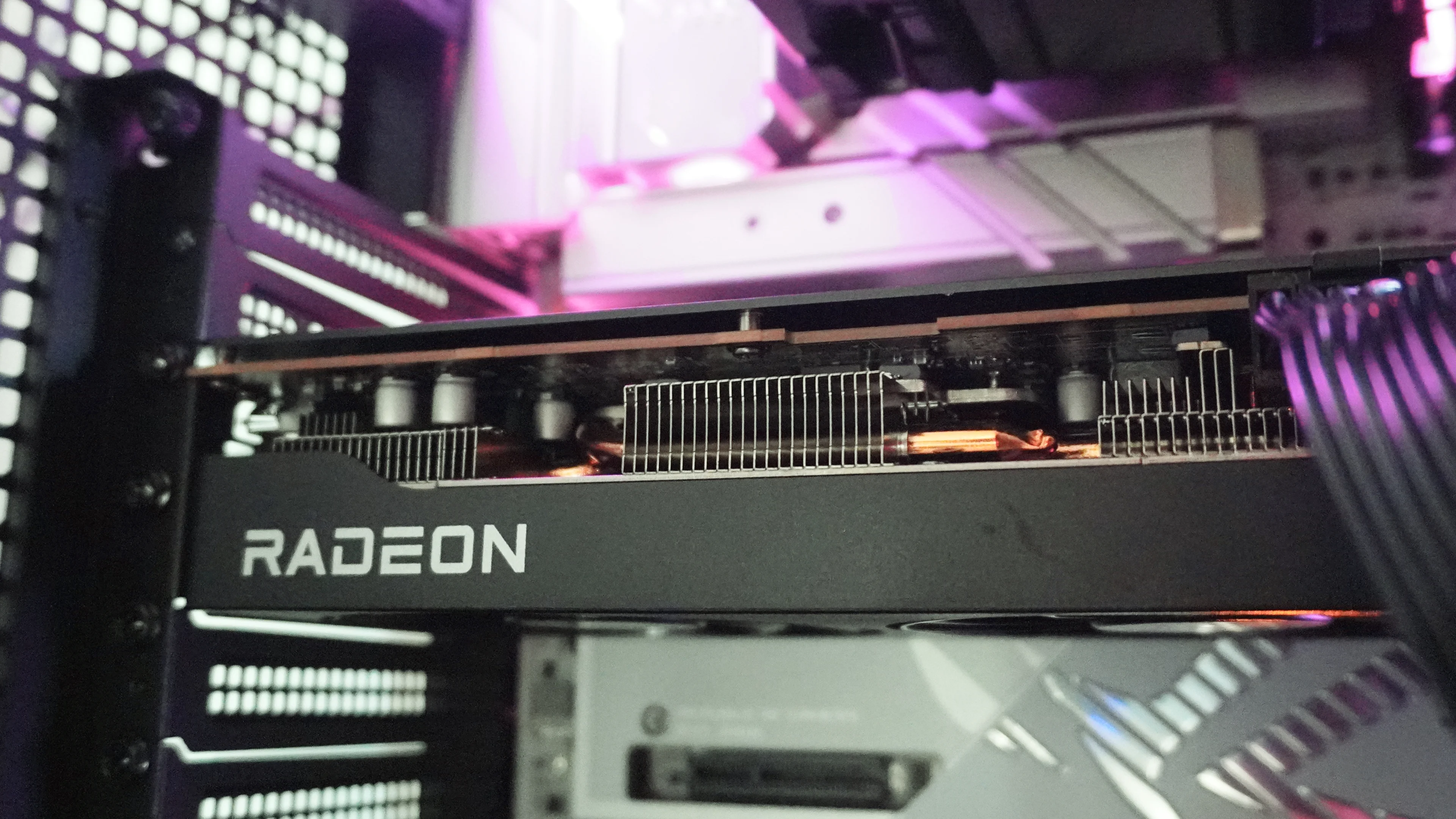 Radeon RX 9070 series graphics card on a review photo.